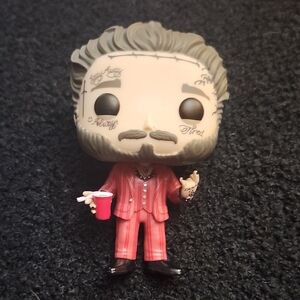 Funko Pop Figure in Red Striped Suit